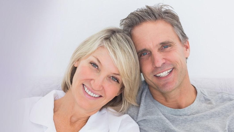 Implant-supported dentures restoring a full smile