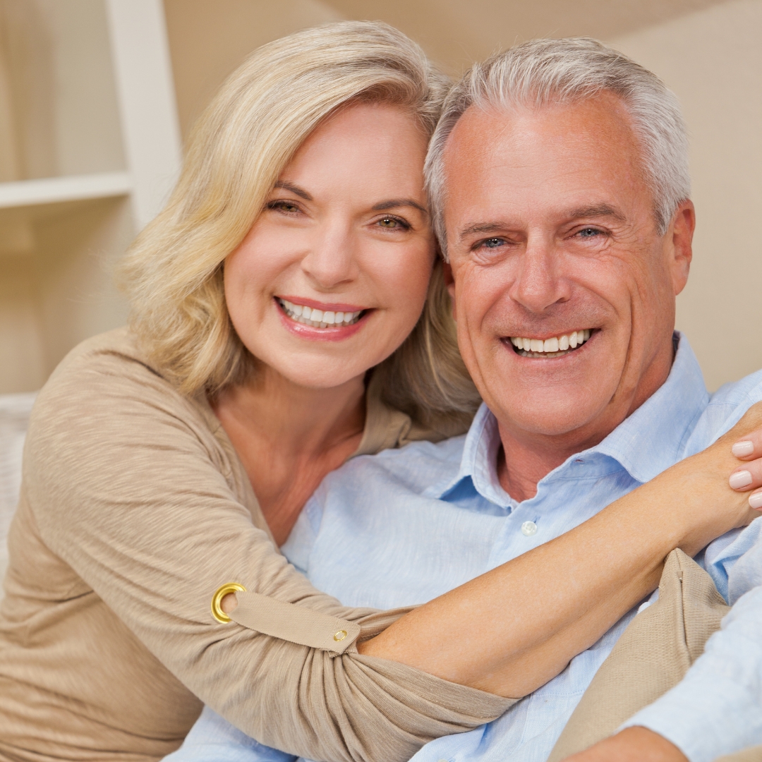 Smiling older couple with confident smiles